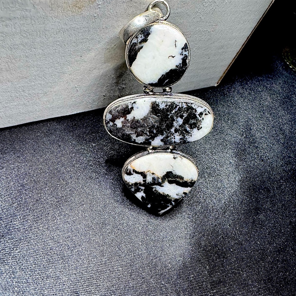 Silver plated and white buffalo pendant
